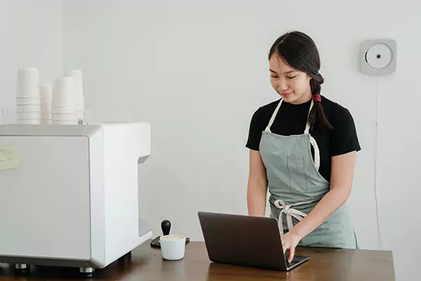 Asian woman managing her business